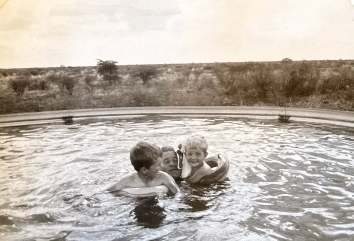 Dieter and sons swimming in new basin